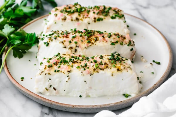 Baked halibut fillets with an herbed mayonnaise crust.