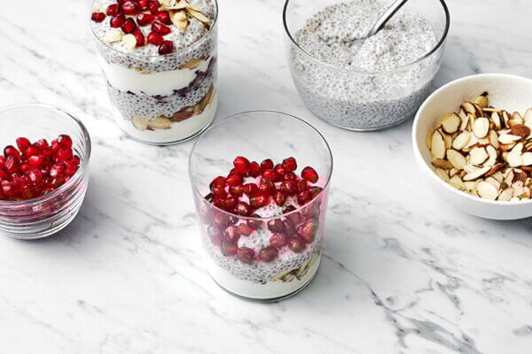 Making pomegranate chia pudding parfaits