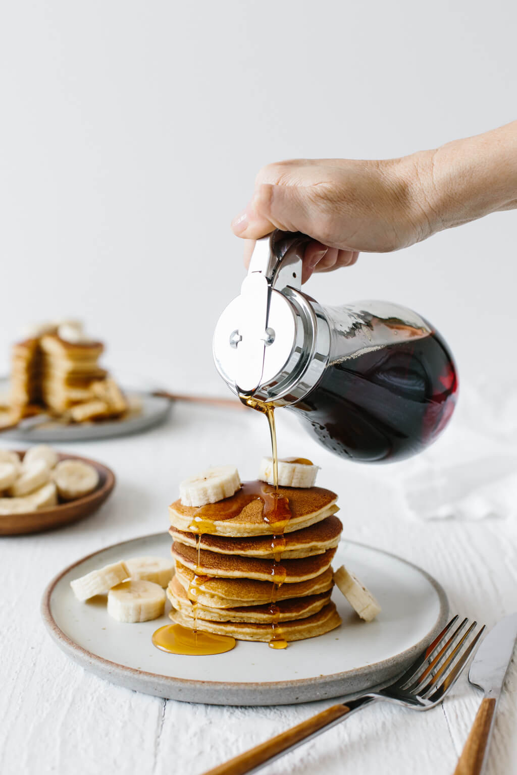 These paleo pancakes are light and fluffy and made from a combination of coconut flour, tapioca flour and almond flour. They're a reader favorite and the best paleo pancakes out there! 