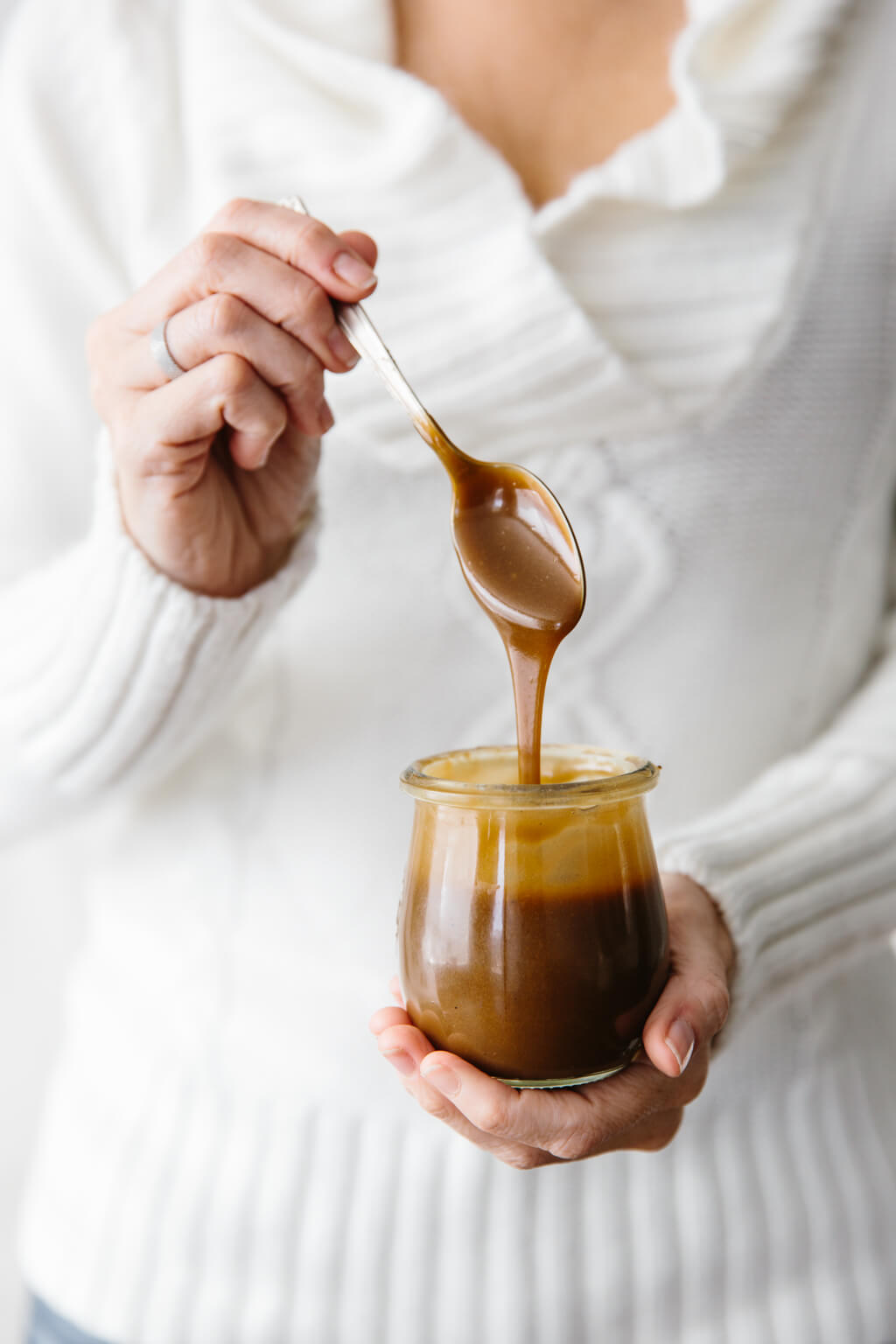Salted caramel sauce that's made from coconut milk and coconut sugar. It's a dairy-free, paleo and vegan caramel sauce. And it's extremely delicious! #CaramelSauce #Salted CaramelSauce #VeganCaramelSauce #CaramelSauceRecipe