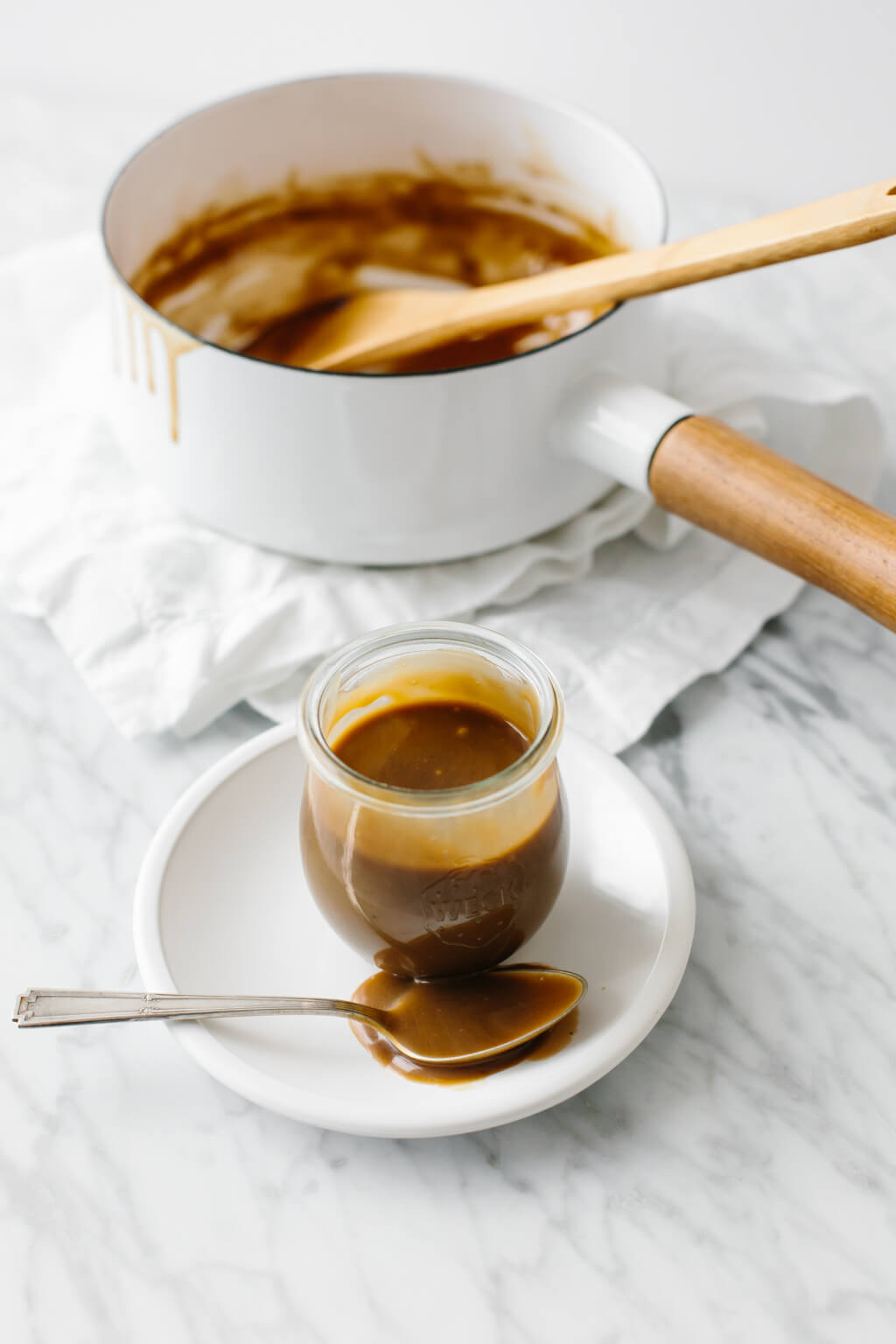 Salted caramel sauce that's made from coconut milk and coconut sugar. It's a dairy-free, paleo and vegan caramel sauce. And it's extremely delicious! #CaramelSauce #Salted CaramelSauce #VeganCaramelSauce #CaramelSauceRecipe