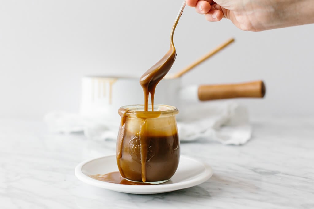 Salted caramel sauce that's made from coconut milk and coconut sugar. It's a dairy-free, paleo and vegan caramel sauce. And it's extremely delicious! #CaramelSauce #Salted CaramelSauce #VeganCaramelSauce #CaramelSauceRecipe
