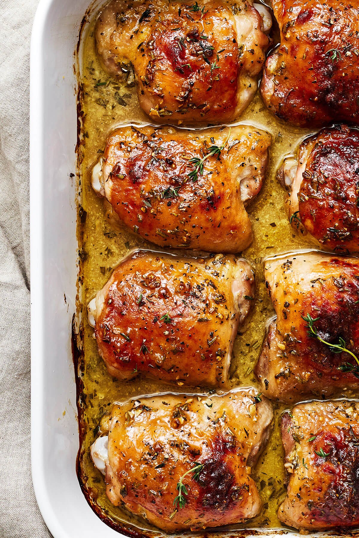 These honey mustard chicken thighs are just what you need to jazz up weeknight dinners! They're extra flavorful, juicy, and crisp. A set of baked honey mustard chicken thighs