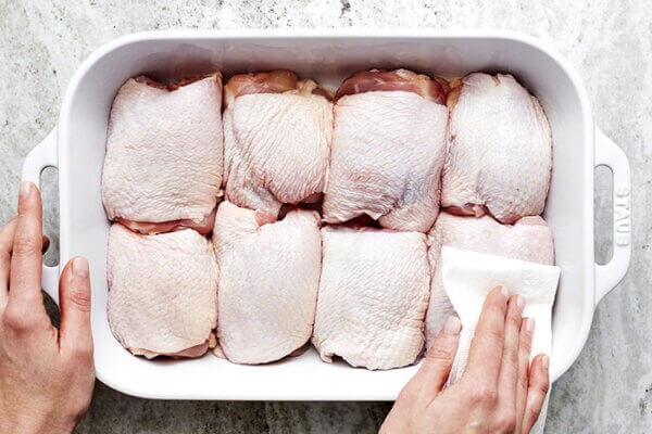 Prepping chicken thighs for baking