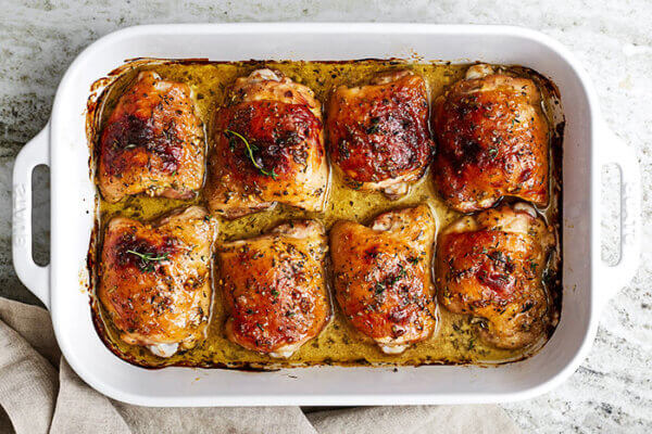 Baked honey mustard chicken in a casserole dish