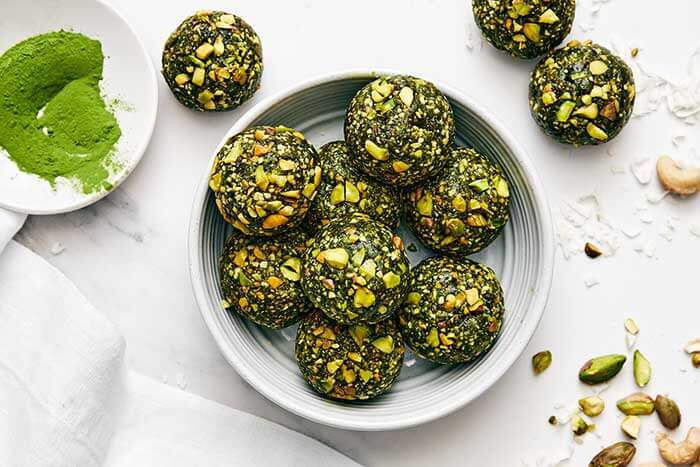 A bowl of matcha energy balls.