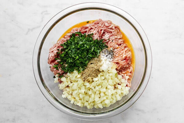 Fennel pork meatball ingredients in a bowl