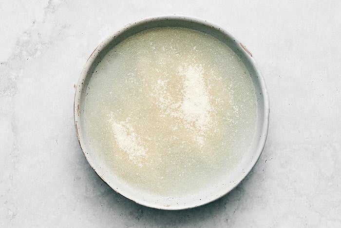 Blooming gelatin on a plate.