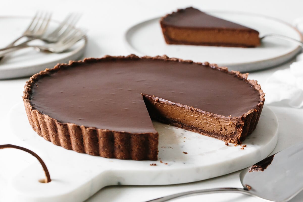 A slice cut from the chocolate tart recipe.