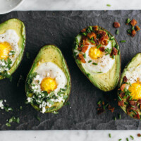 Baked eggs in avocado. A perfect gluten-free, paleo breakfast.