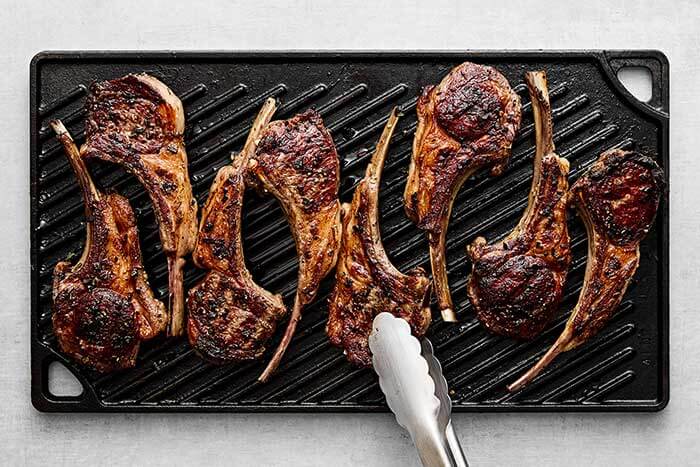 Showing how to grill lamb chops.