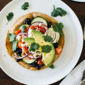 (gluten-free) Black bean Mexican pizza on cassava flour tortillas. A healthy, vegetarian version of a Mexican pizza.