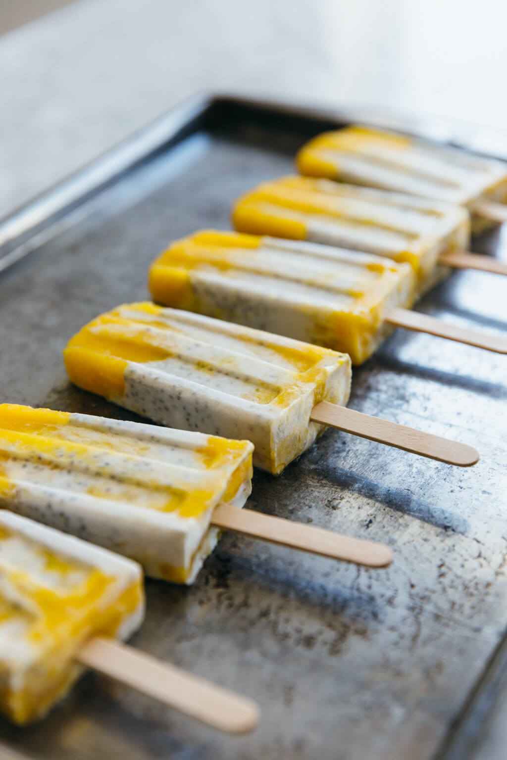 Coconut chia mango popsicles. Dairy-free and refined-sugar free. 