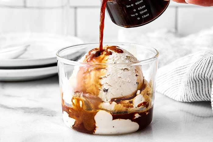 Poured espresso onto ice cream for affogato.