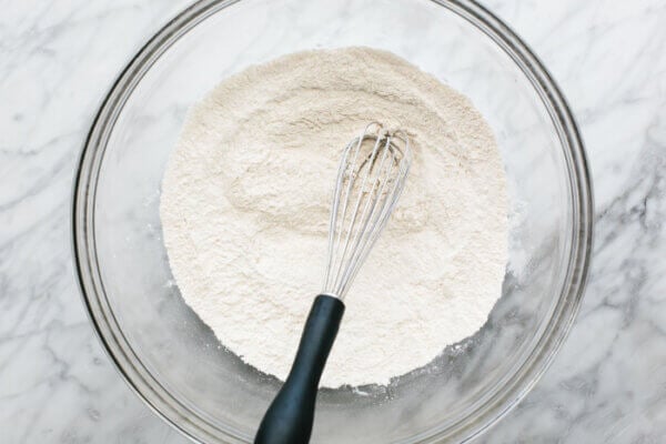 Whisking cassava flour tortilla dough in a bowl