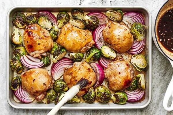 Cooking a sheet pan of balsamic chicken