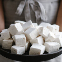 These healthy, paleo-friendly homemade marshmallows use honey or maple syrup instead of corn syrup and high-quality gelatin.