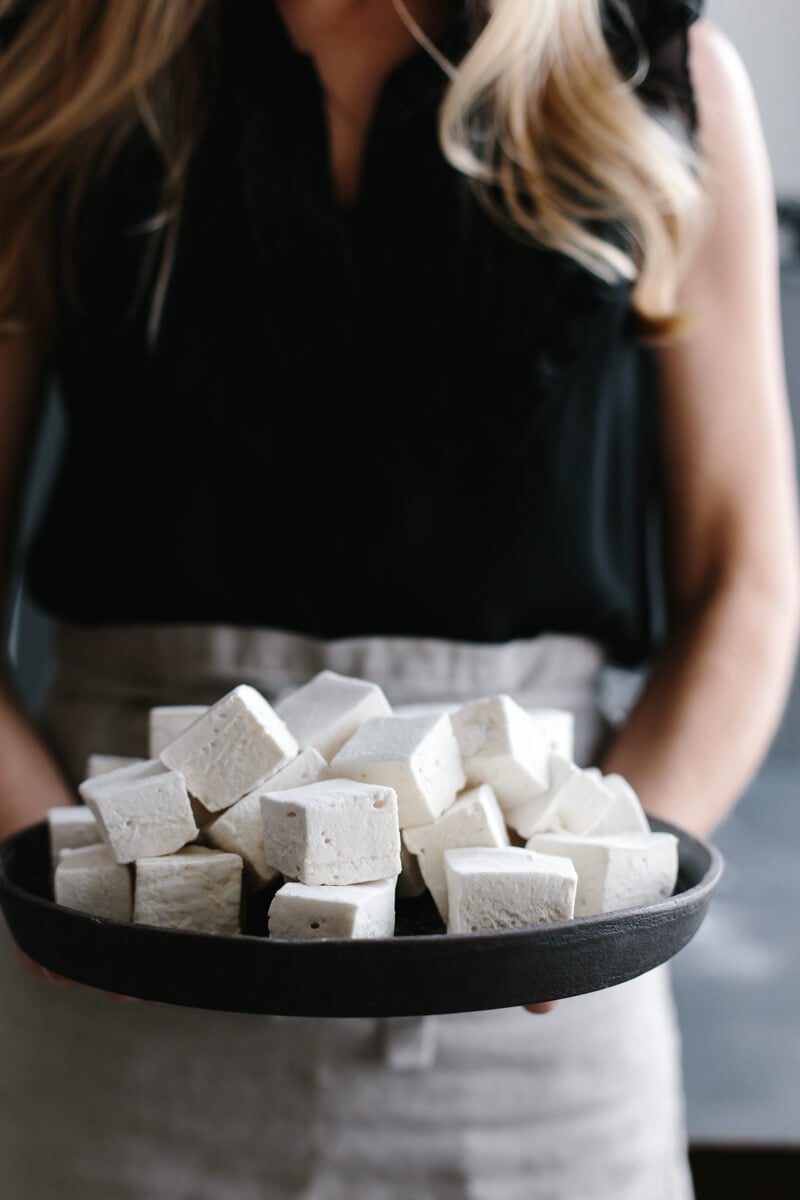 Healthier homemade marshmallows use honey or maple syrup instead of corn syrup and high-quality gelatin. They're also paleo friendly. 
