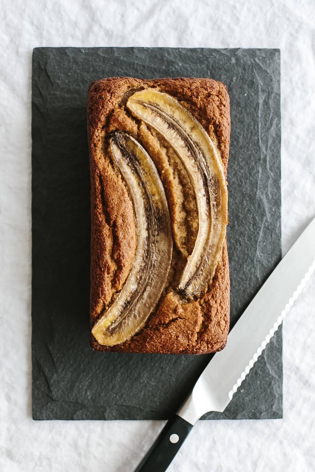 Paleo Banana Bread is super moist, delicious and easy to make. It's gluten-free, grain-free and dairy-free and the perfect healthy quick bread recipe.