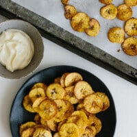 (gluten-free, paleo, whole30) These baked plantain chips are a healthy, homemade snack for when you're craving something salty and crunchy.