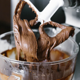 This vegan chocolate buttercream frosting is dairy-free and can be modified into a paleo buttercream frosting as well. It's rich, decadent and delicious!