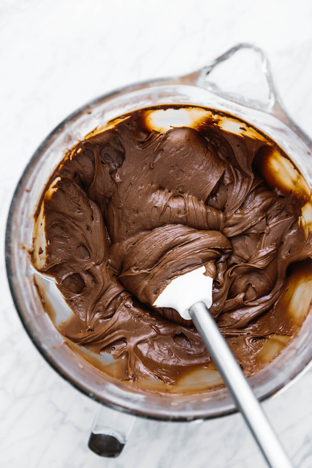 This vegan chocolate buttercream frosting is dairy-free and can be modified into a paleo buttercream frosting as well. It's rich, decadent and delicious!