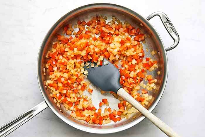 Cooked vegetables in a pan.