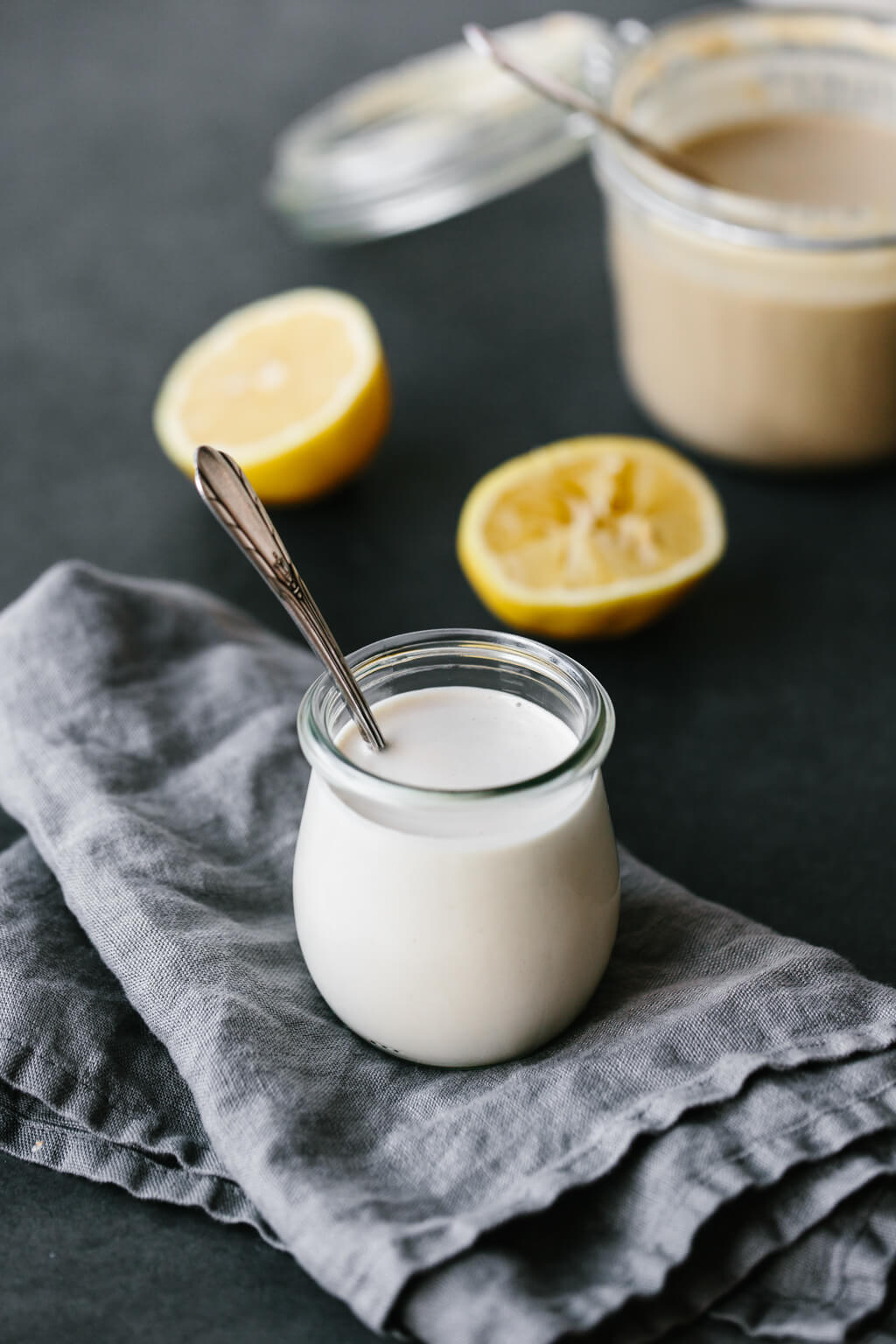 This lemon tahini dressing is oil-free, dairy-free and vegan. It's a tasty, creamy, zesty salad dressing that's super versatile and adaptable. #LemonTahiniDressing #Tahini