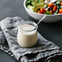 This lemon tahini dressing is oil-free, dairy-free and vegan. It's a tasty, creamy, zesty salad dressing that's super versatile and adaptable. #LemonTahiniDressing #Tahini