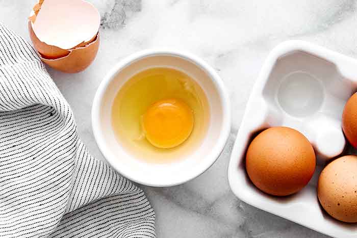 Step two of poached eggs: Transfer the egg.