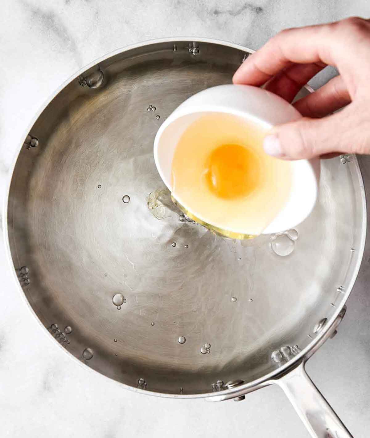Learn how to make perfect poached eggs every time with this easy method! It'll be a delicious addition to a healthy breakfast. Step three of poached eggs: Create a vortex.