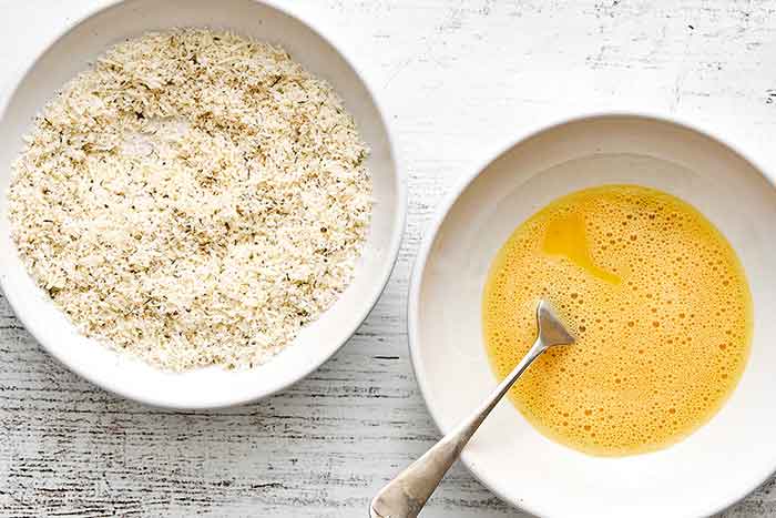 Mixed eggs and parmesan for zucchini fries.