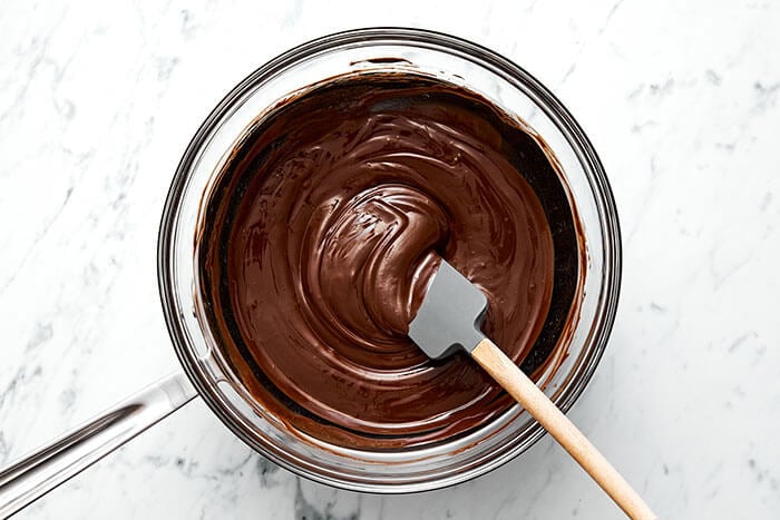 A bowl of melted chocolate.