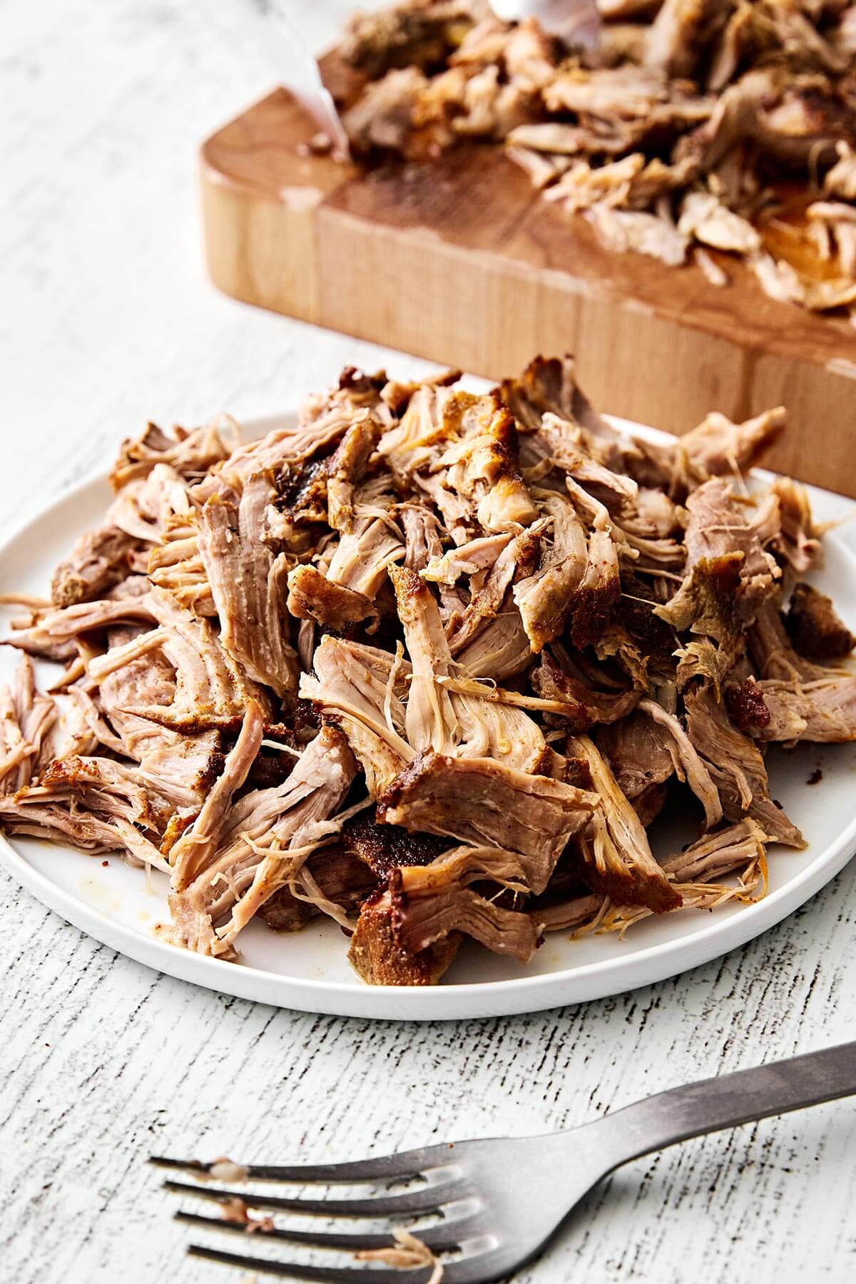 Slow cooker pulled pork on a plate.