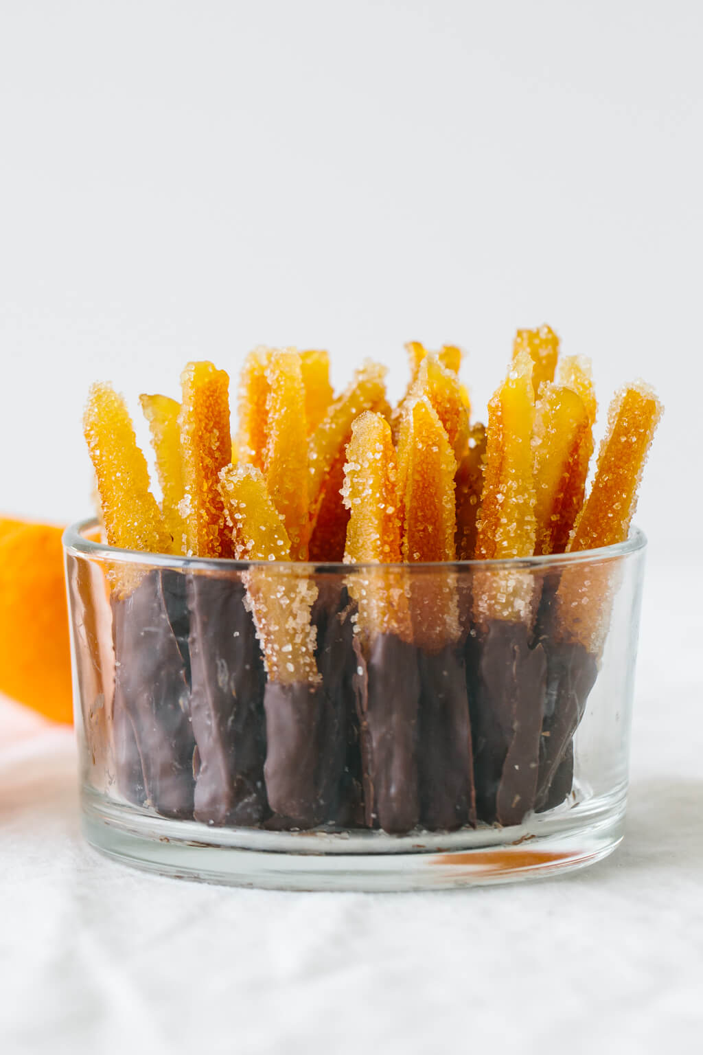 Candied orange peel is the perfect sweet treat. It's slightly bitter with a burst of orange and deliciously sweet.