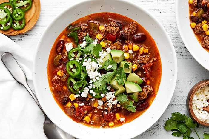 A white bowl of taco soup