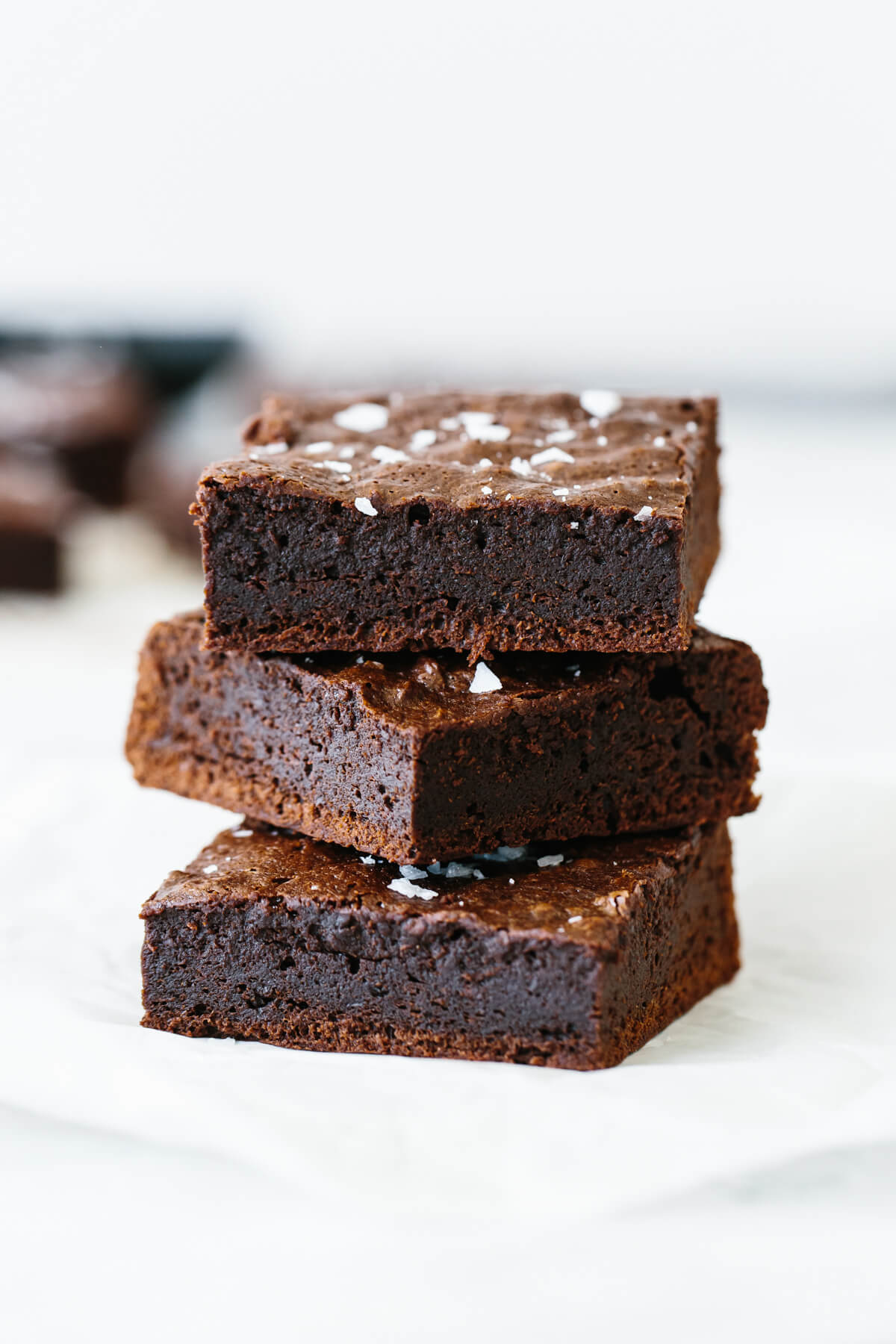A stack of paleo brownies.