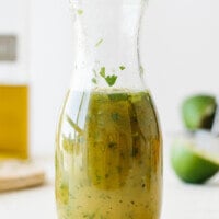 Citrus lime vinagrette made from orange juice, lime juice, chopped cilantro, diced jalapeno, olive oil salt and pepper.