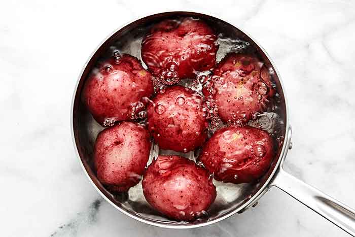 Boiled potatoes in a pot.