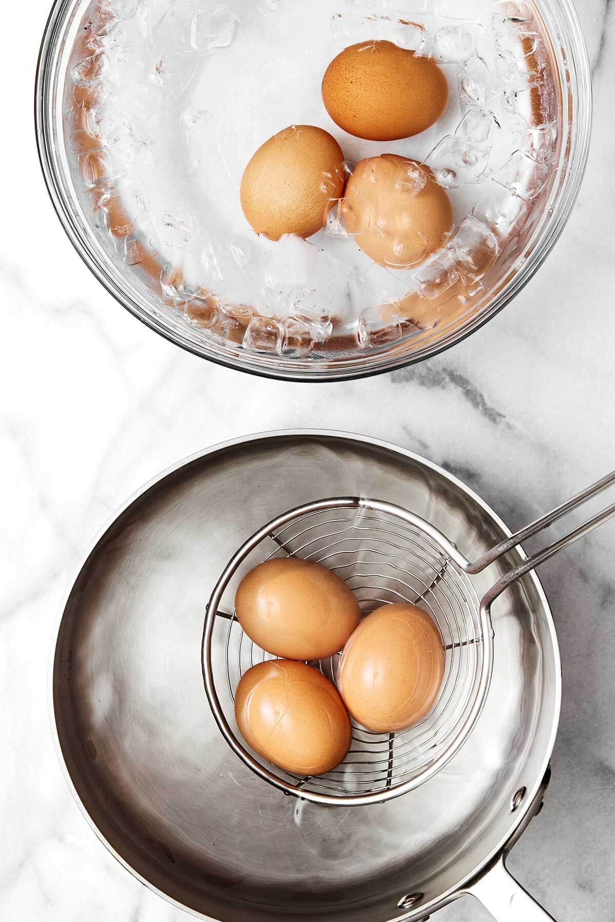 Boiling eggs in a pot.