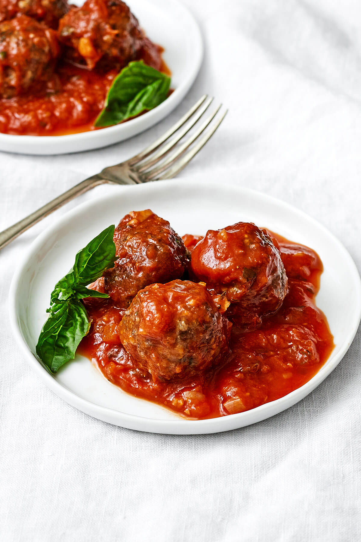 Meatballs with marinara sauce on a plate