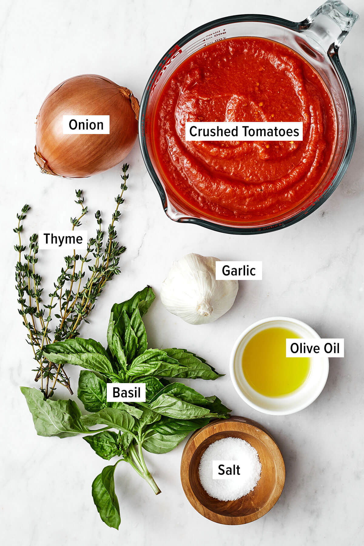 Ingredients for marinara sauce on a table
