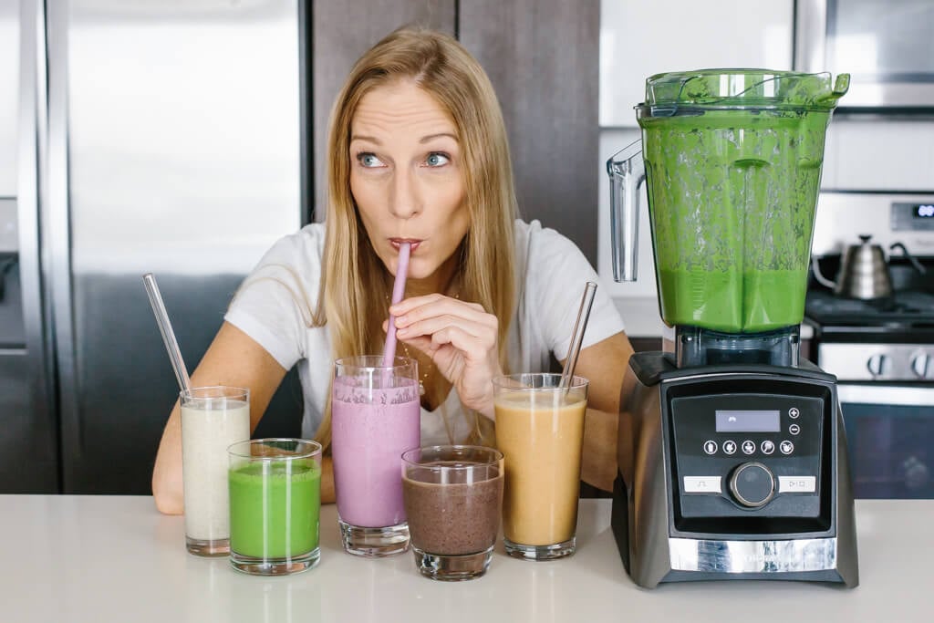 Ready for delicious low sugar smoothies! You're gonna love these 5 healthy smoothie recipes! Lisa Bryan drinking a variety of smoothies