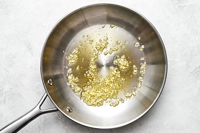 Cooked garlic in a pan.