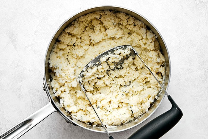 Mashed cauliflower in a pot.