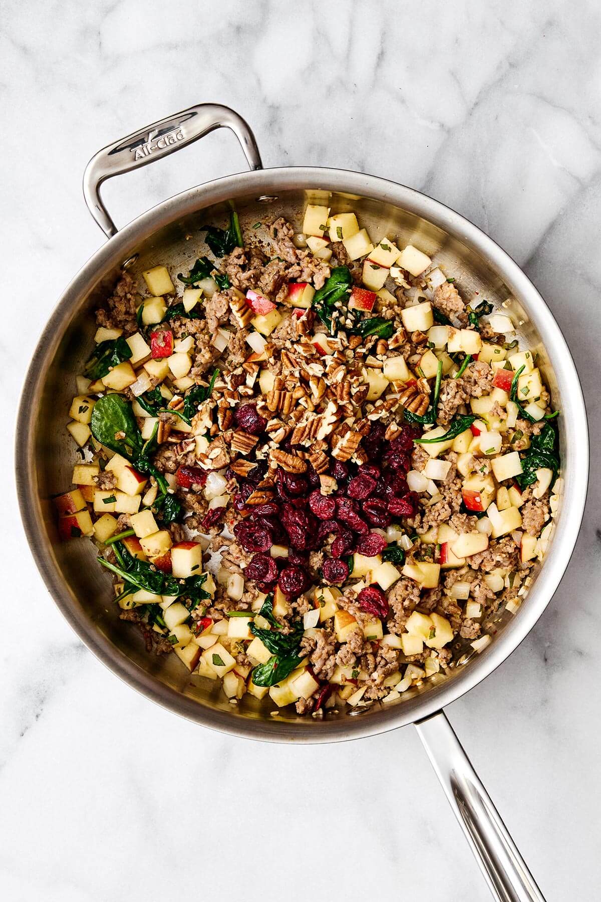 Making filling for stuffed squash.