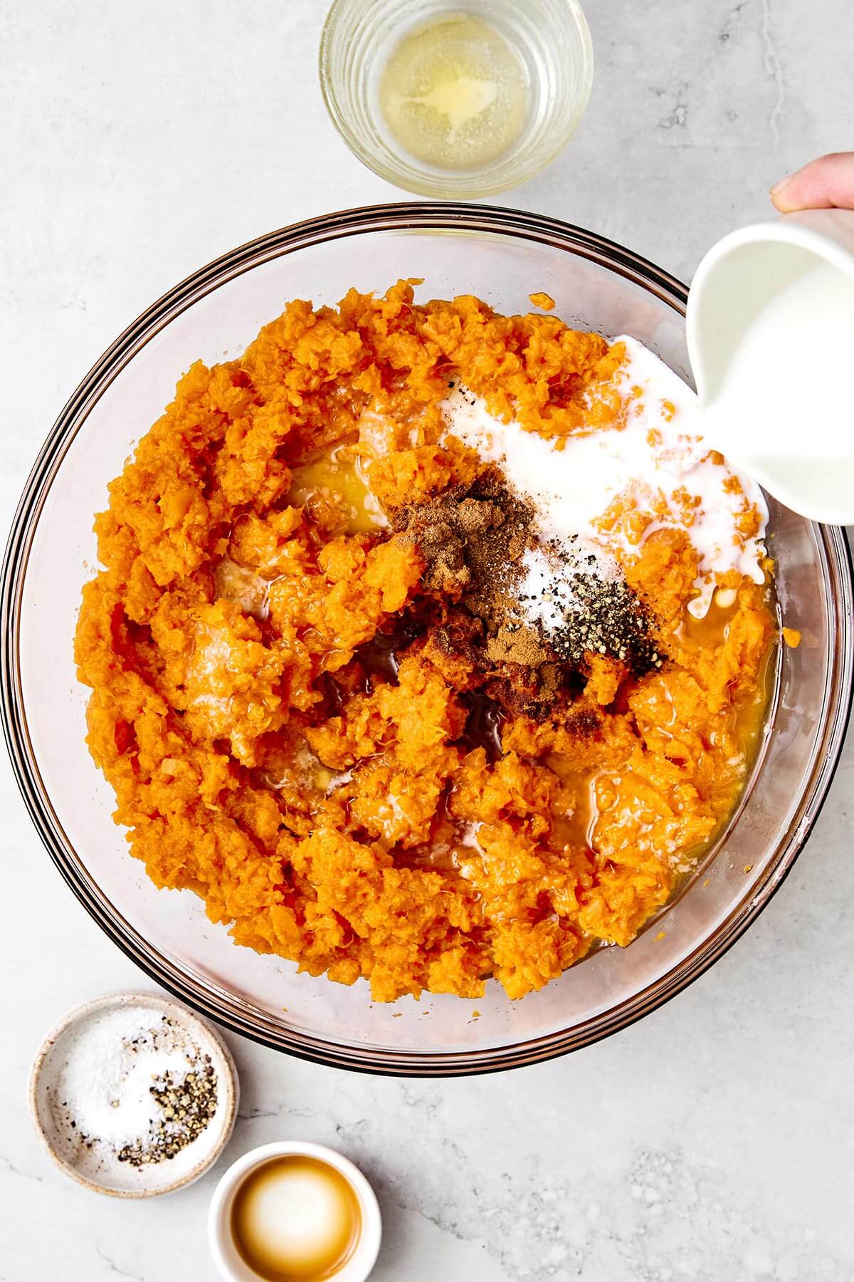 Making a mashed sweet potato layer.