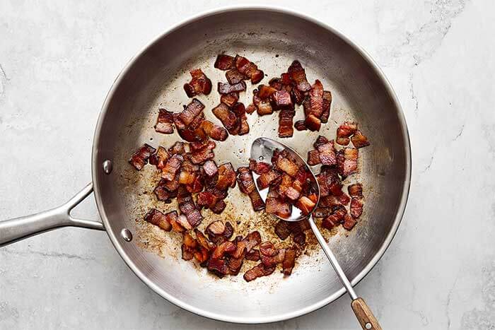 Cooked bacon in a pan.