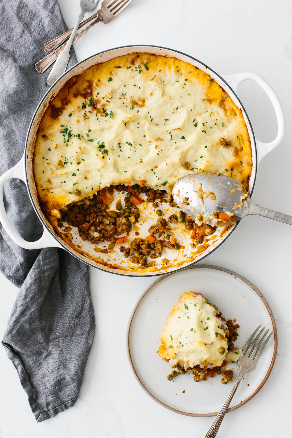 Shepherd's pie is a classic comfort food recipe that's healthy, hearty and filling! Shepherd's pie on a table next to a napkin
