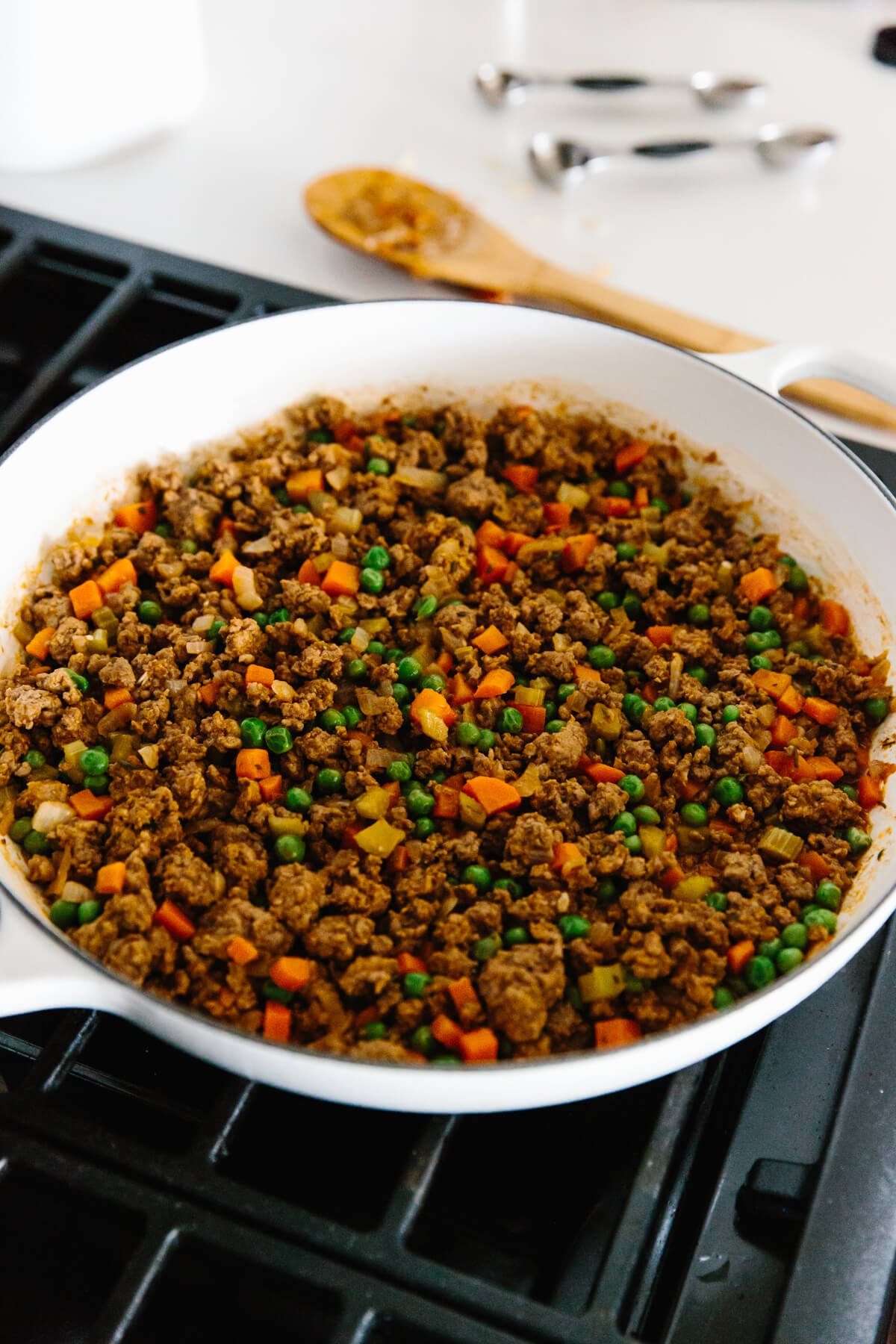 Easy Shepherd's Pie Recipe Cooking shepherd's pie filling in a pan.